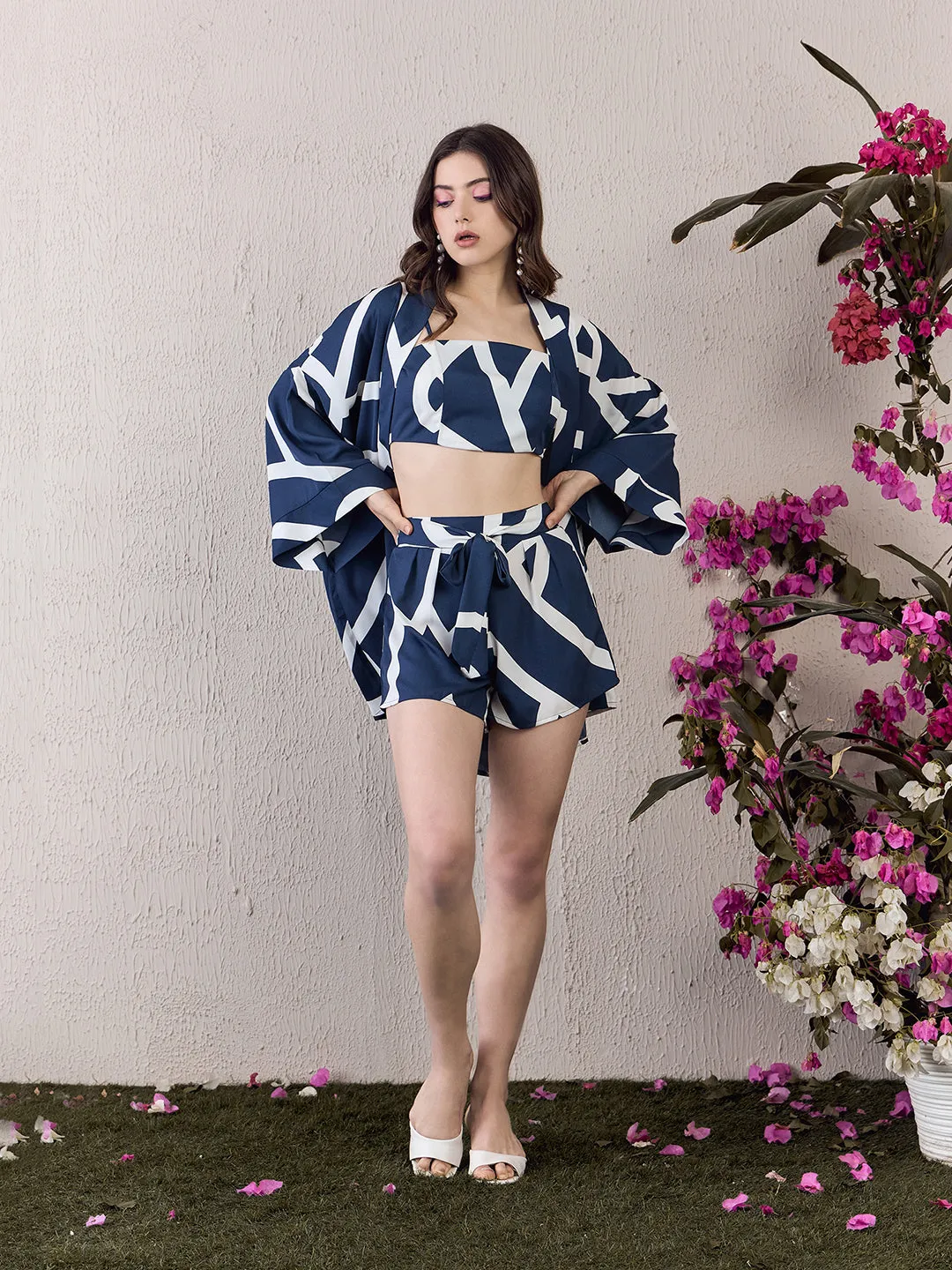 Berrylush Women Navy Blue & White Geometrical Printed Square Neck Crop Top & Tie-Up Front Shorts With Shrug