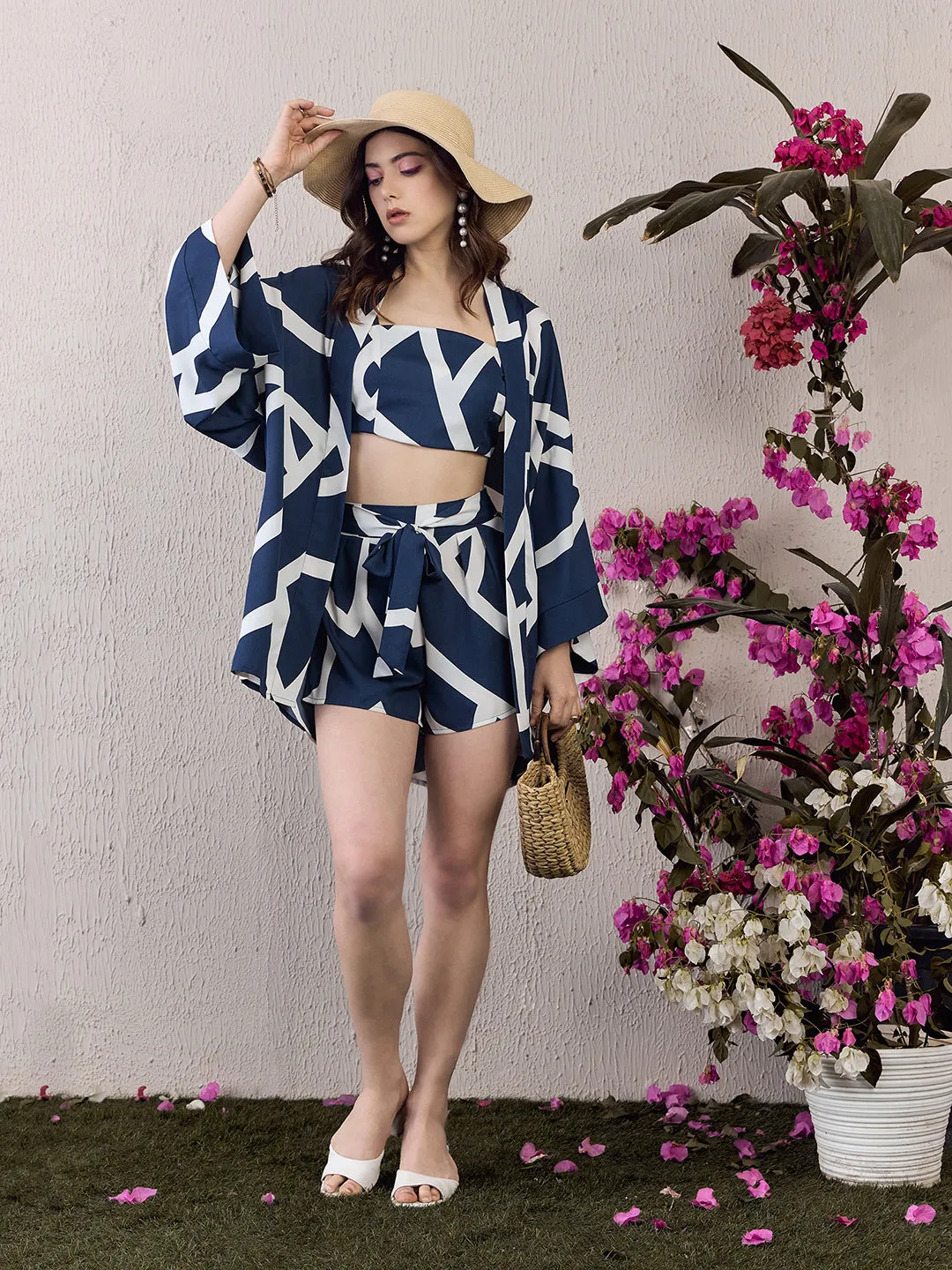 Berrylush Women Navy Blue & White Geometrical Printed Square Neck Crop Top & Tie-Up Front Shorts With Shrug