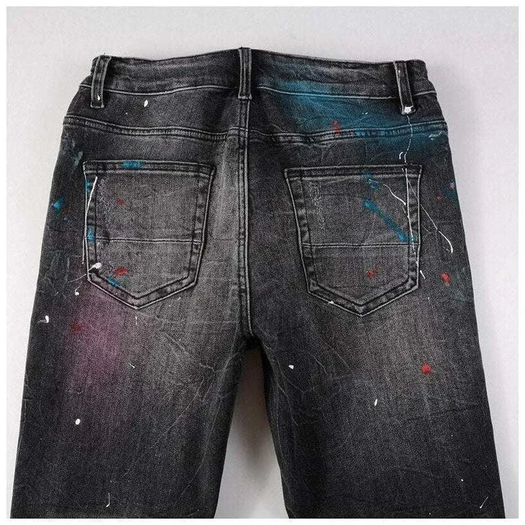 Distressed knees painted men's jeans