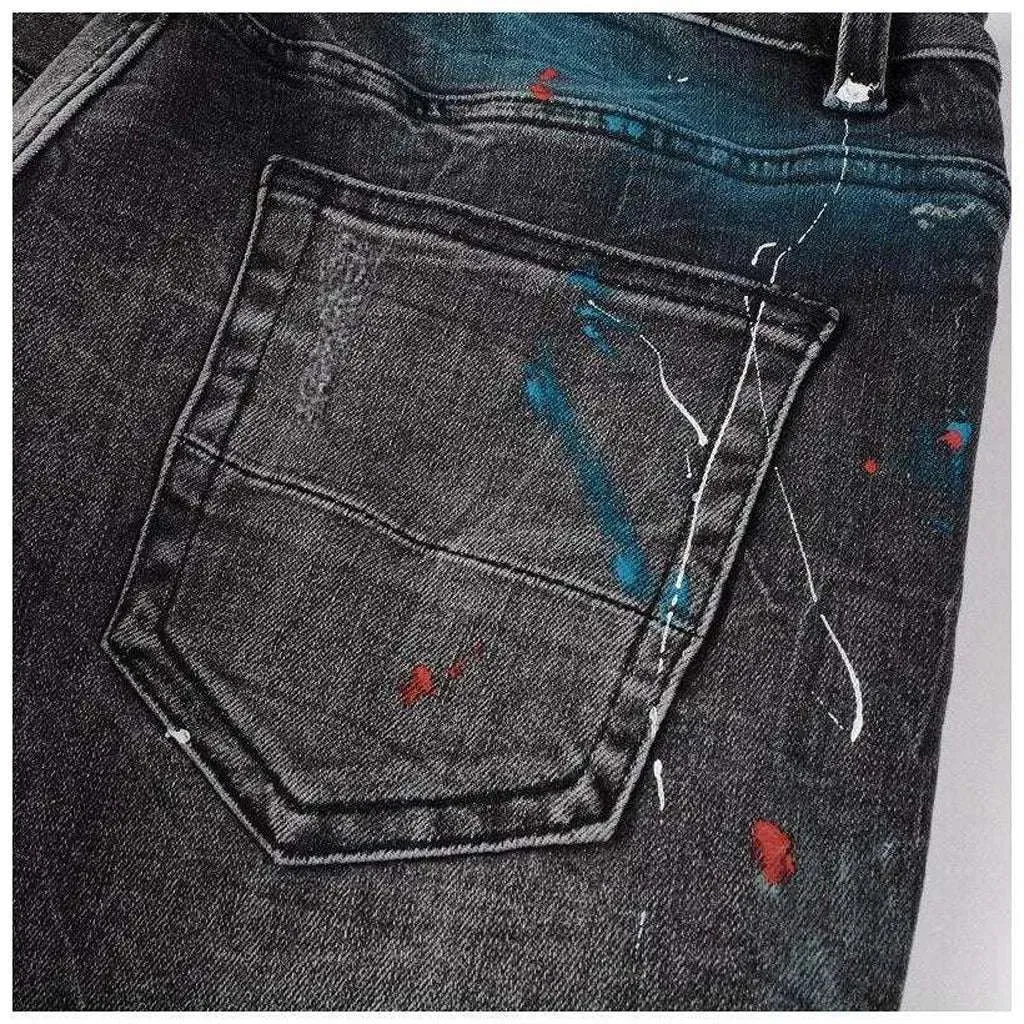 Distressed knees painted men's jeans