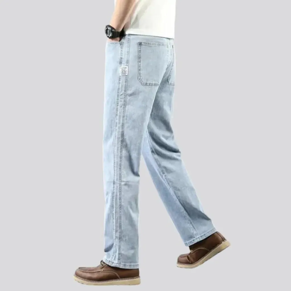 Thin men's whiskered jeans