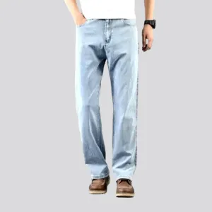 Thin men's whiskered jeans