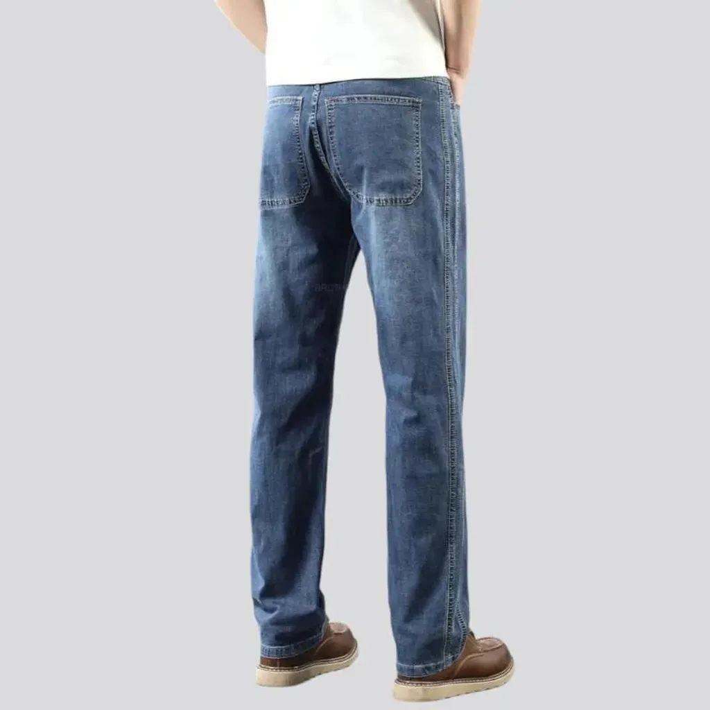 Thin men's whiskered jeans