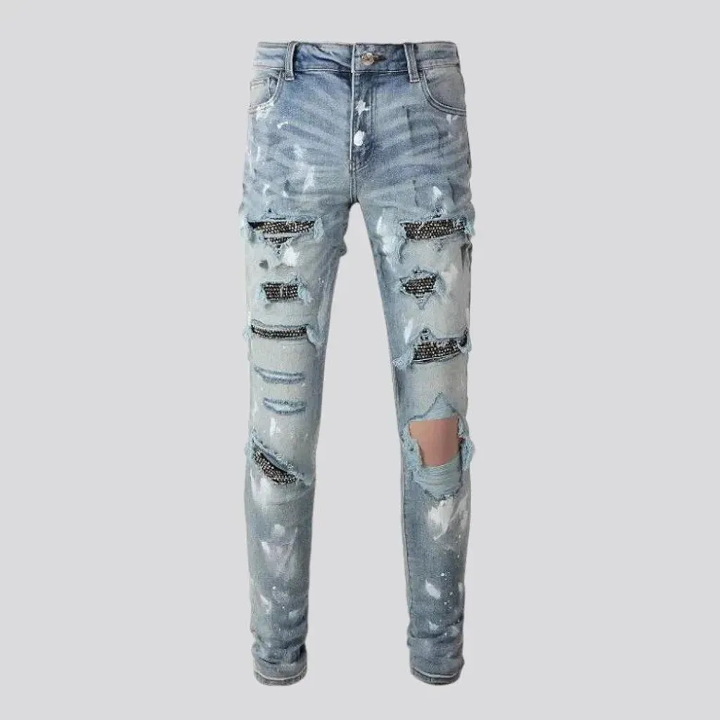 Tight men's frayed jeans